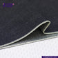 Close-up of DEEP INDIGO GREENCAST SELVEDGE DENIM fabric with a visible brand logo on a white background