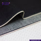 Close-up of DEEP INDIGO STRETCH SELVEDGE DENIM fabric with 'Indigotailor' branding on a dark background