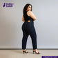 Woman wearing DEEP INDIGO STRETCH SELVEDGE DENIM jeans with 'Indigo Tailor' logo and website on a gray background