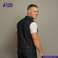 Man wearing a DENIM BIKER VEST and white shirt, standing against a plain background with 'Indigo Tailor' branding.
