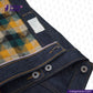 Close-up of DENIM BIKER VEST with a plaid pattern peeking out, featuring 'Indigotailor' branding.
