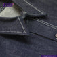 Close-up of DENIM CHORECOAT shirt with visible stitching, featuring the Indigotailor brand logo.