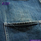 Close-up of DENIM CHORECOAT shirt fabric with 'Indigotailor' logo and website.