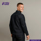 Man wearing a DENIM CHORECOAT jacket with 'Indigo Tailor' logo and website on a gray background