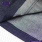 Close-up of DENIM HOODIE with 'Indigo Tailor' branding.