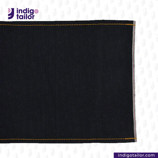 DOUBLE BLACK STRETCH SELVEDGE DENIM fabric with yellow stitching on a white background, featuring the Indigotailor logo.