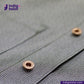 Close-up of a button on EASY JACKET OLIVE WABASH ONE WASH with 'indigotailor' branding.