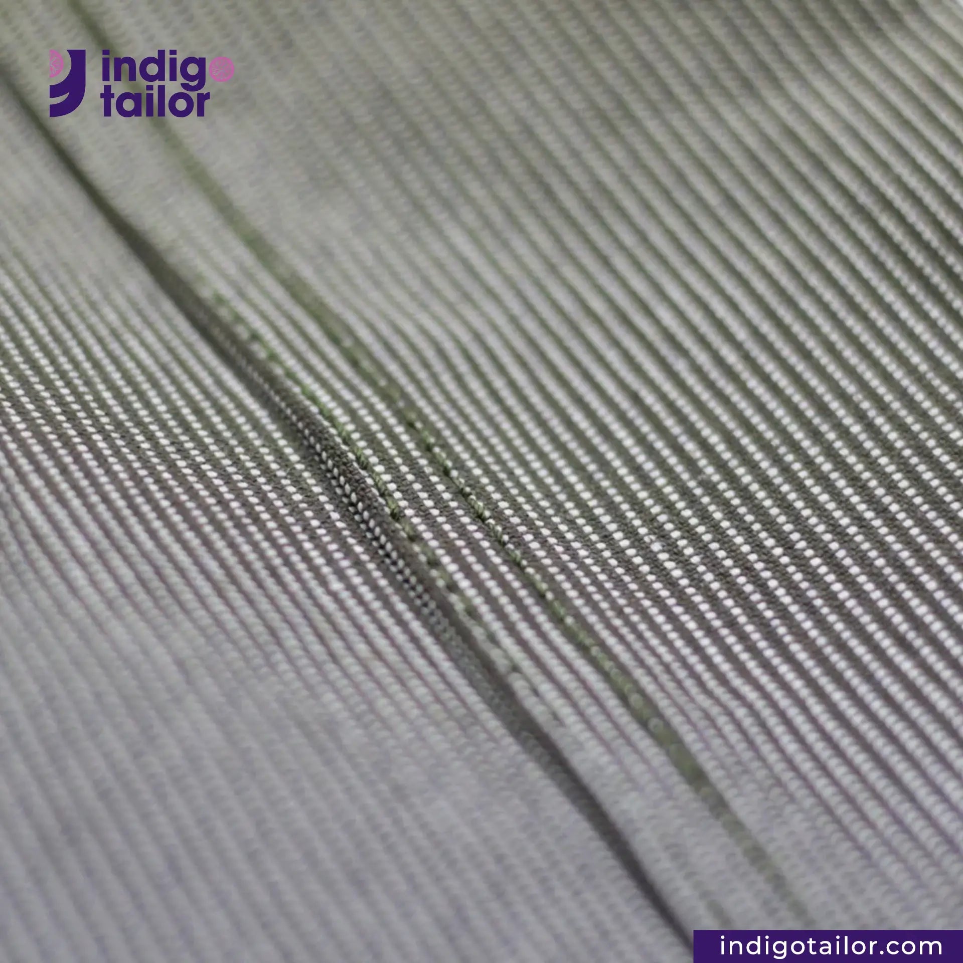 Close-up of EASY JACKET OLIVE WABASH ONE WASH with 'Indigotailor' logo and website.