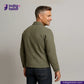 Man wearing a EASY JACKET OLIVE WABASH ONE WASH with 'Indigo Tailor' logo and website on a gray background