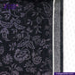 FLORAL EMBOSSED DENIM fabric with floral pattern and white border, featuring Indigo Tailor logo.