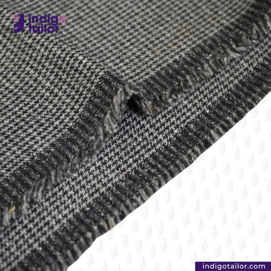Close-up of GREYHOUND TWEED HOUNDSTOOTH with 'Indigotailor' logo.