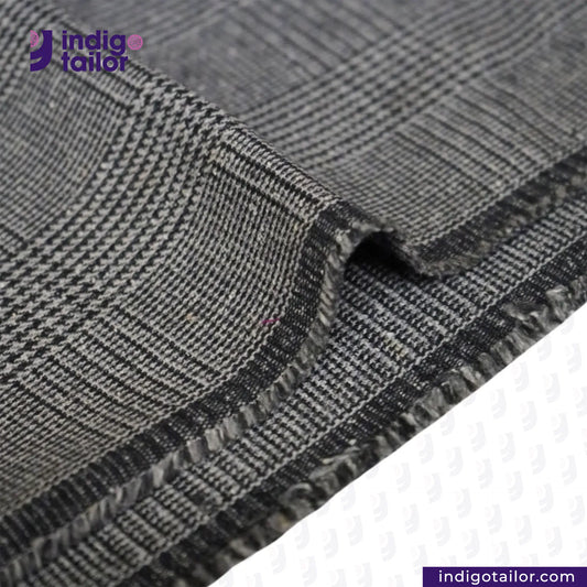 Close-up of GREYHOUND TWEED PLAID fabric with 'Indigotailor' logo.
