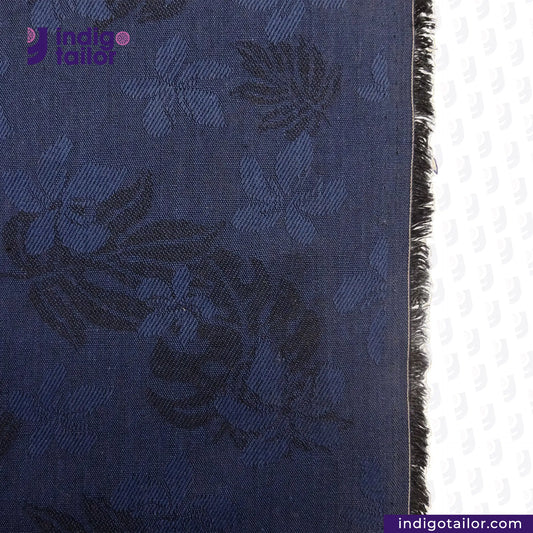 INDIGO FLORAL JACQUARD fabric with black floral patterns on a white background, featuring the brand 'Indigotailor'.