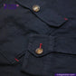 Close-up of a INDIGO HARRINGTON JACKET with buttons and red stitching, featuring 'Indigo Tailor' branding.