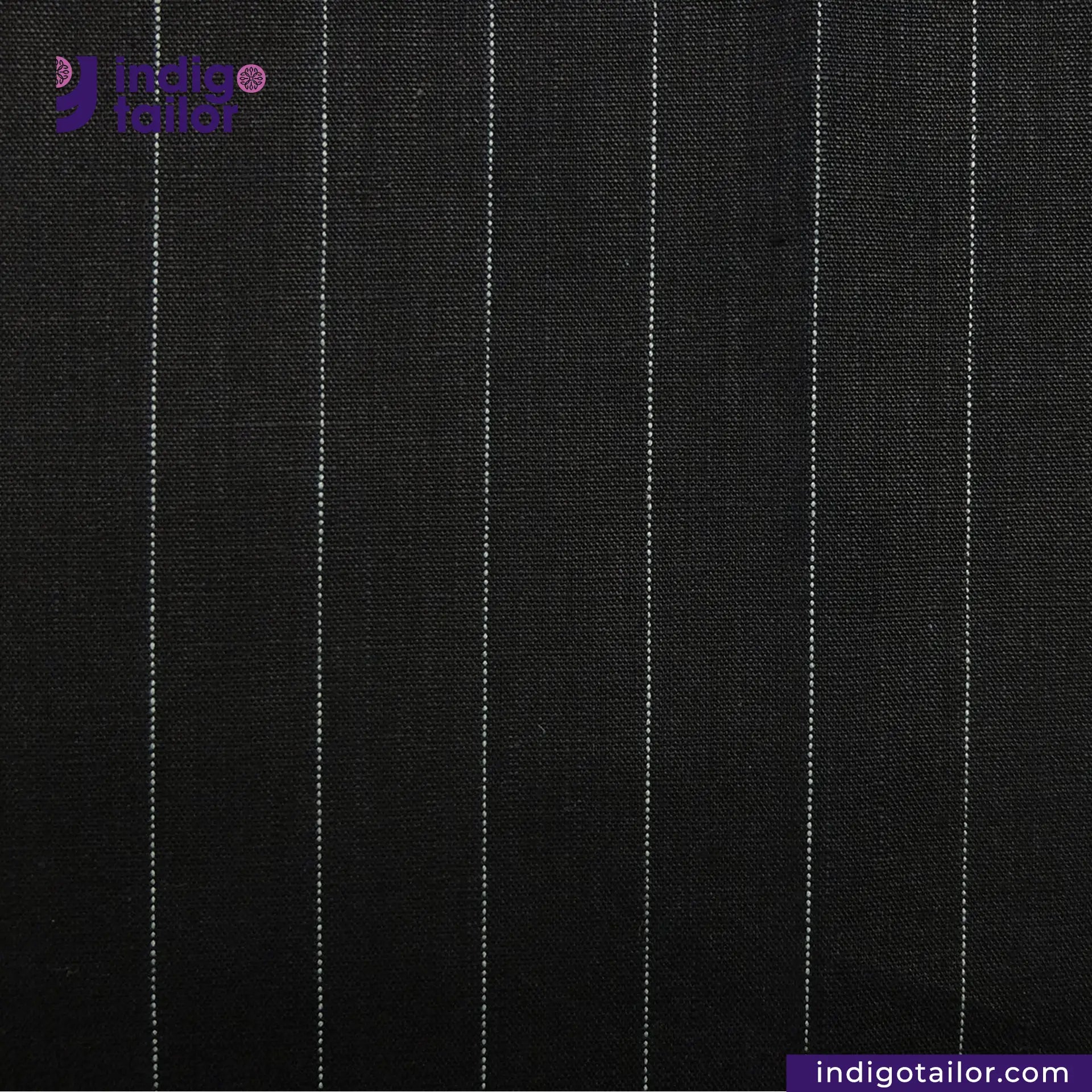 INDIGO PINSTRIPES fabric with white pinstripes and Indigo Tailor logo.