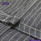Close-up of a button on a INDIGO VINTAGE STRIPE WORK VEST with 'Indigotailor' branding.