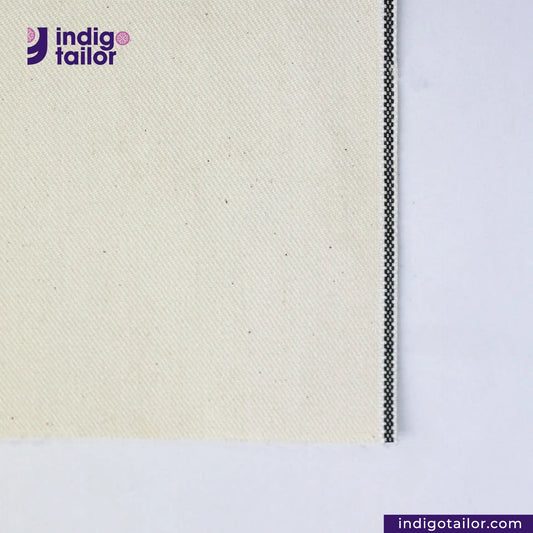 KINARI SELVEDGE DENIM fabric swatch with 'indigotailor' logo and website URL.