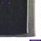 Close-up of KUROKI CLASSIC RED LINE SELVEDGE fabric with a visible brand logo and website address.