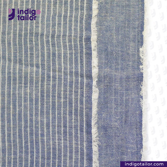 LOW TENSION VINTAGE HICKORY CHAMBRAY fabric with blue and white stripes and 'indig tailor' branding.