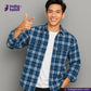 Man wearing a MADRAS SPRING BLUE  WHITE CHECK shirt giving a thumbs up against a gray background with 'Indigotailor' branding.