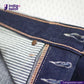 Close-up of MEDIUM BLUE DENIM LIVIDUS SELVEDGE fabric with brown stitching, featuring the Indigotailor logo.