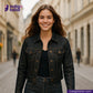 Woman wearing a METALLIC GOLD WEFT SELVEDGE DENIM jacket on a city street with Indigotailor logo.