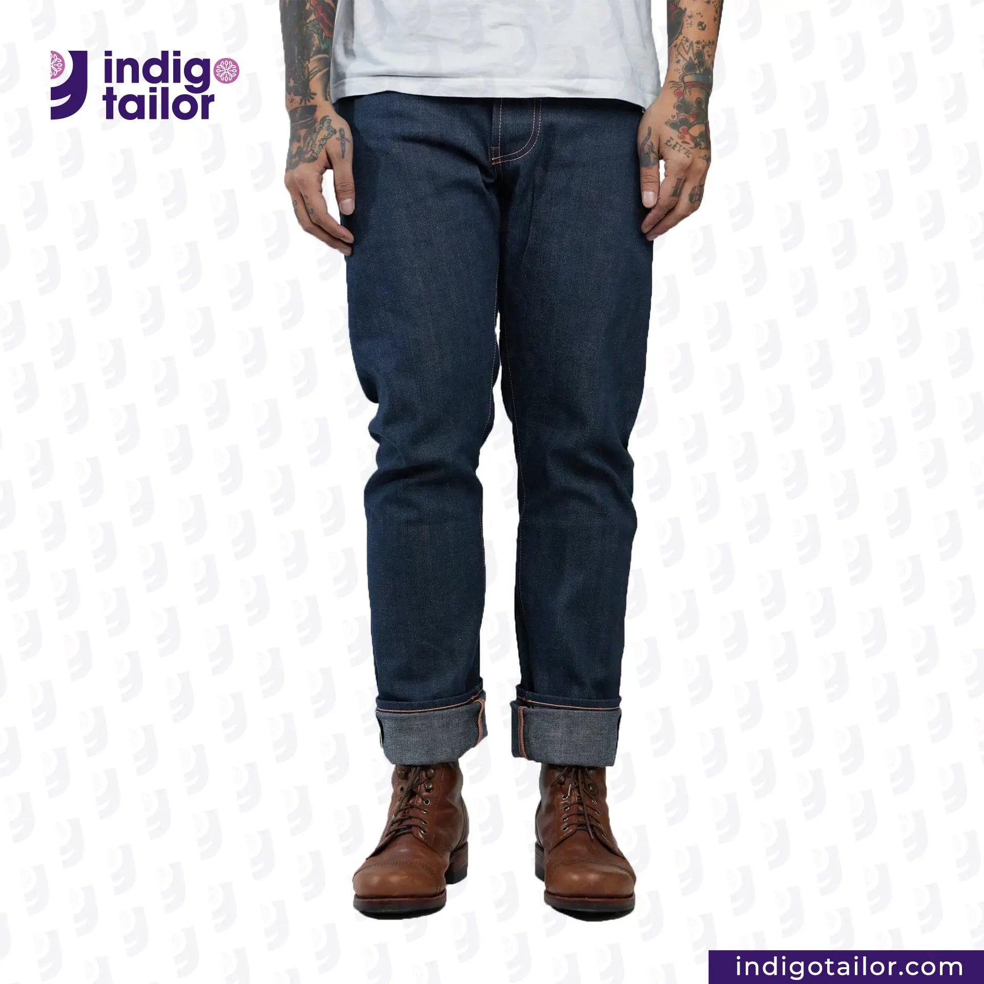 Person wearing NATURAL INDIGO DENIM jeans and brown boots with 'Indigo Tailor' logo.