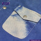 Close-up of a NATURAL INDIGO SUEDE SHACKET pocket with a button, featuring the 'indigotailor' brand.