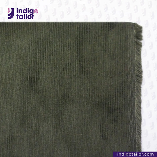 Close-up of OLIVE CORDUROY fabric with 'Indigo Tailor' logo at the top.