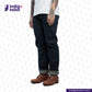 Person wearing dark blue jeans and brown shoes on a white background with 'Indigo Tailor' branding.