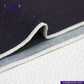 Close-up of ORIGINAL BLUE SELVEDGE DENIM fabric with visible stitching on a white background, featuring the Indigo Tailor logo.