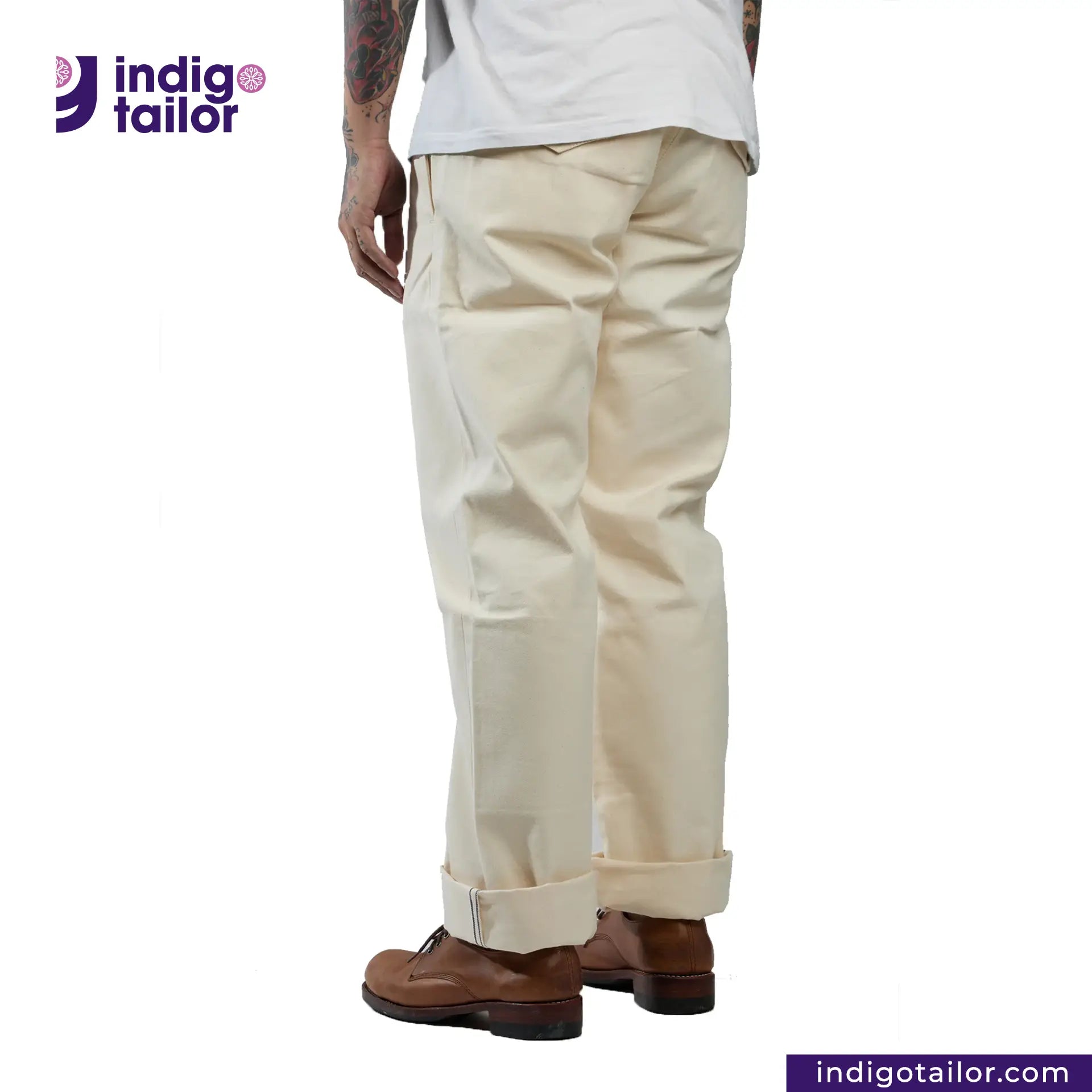 Officer Trousers (Off-White) pants worn by a person on a white background with 'Indigo Tailor' branding.
