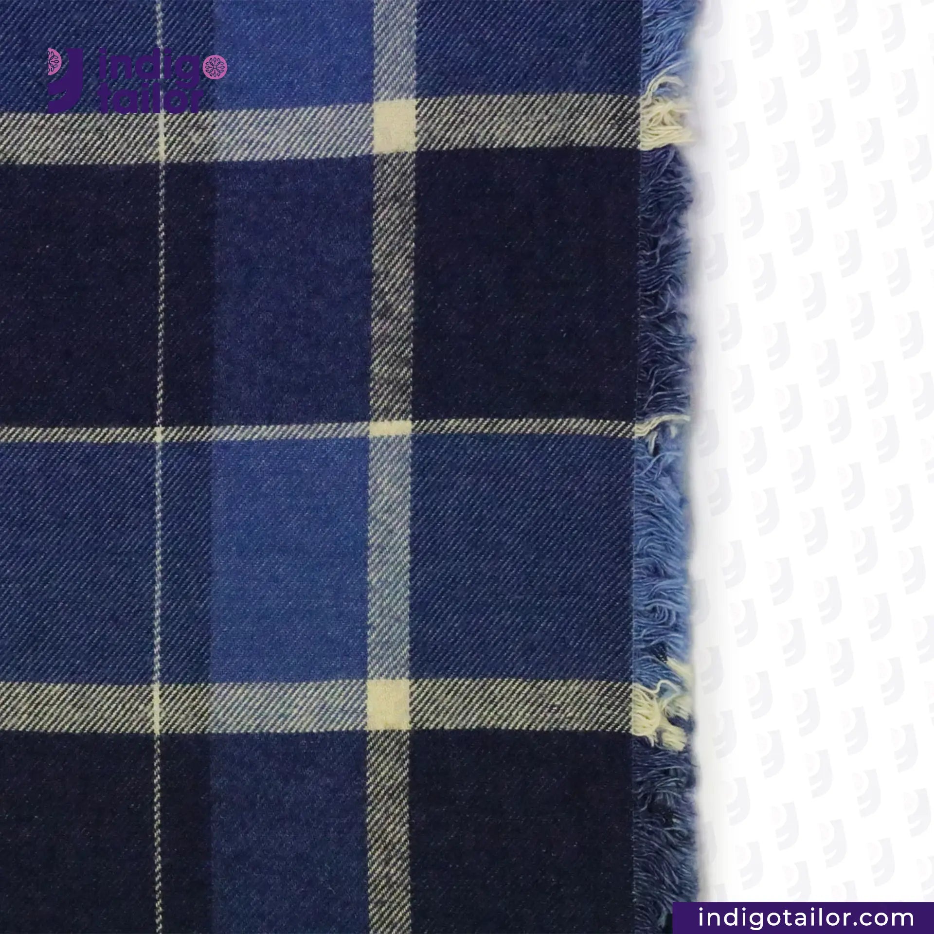 Close-up of PLAID FLANNEL DEEP INDIGO NAVY/BEIGE fabric with a brand logo in the corner.