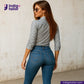 Woman wearing a RAILROAD SELVEDGE HICKORY shirt and blue jeans with 'Indigotailor' branding.