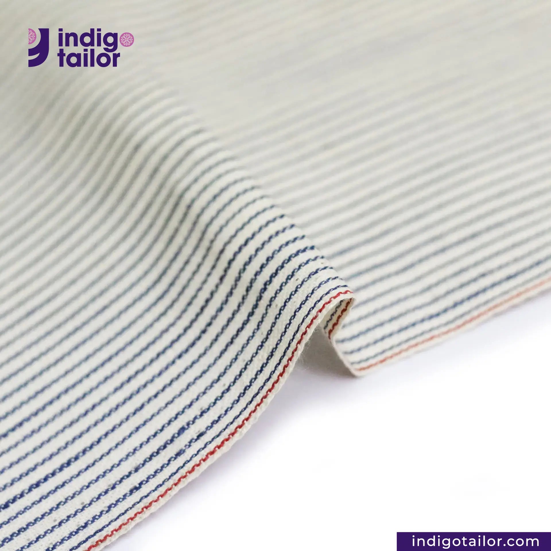 RAILROAD SELVEDGE HICKORY fabric with blue and red lines on a white background, featuring the Indigotailor logo.