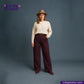 Person wearing a beige sweater, brown hat, and RED SASHIKO pants on a gray background with 'Indigotailor' branding.