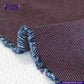 Close-up of fabric with 'indigotailor' branding on a textured background. RED SASHIKO
