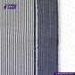 Close-up of REVERSIBLE CHAMBRAY BLUE GREY WITH SUBTLE HICKORY STRIPES fabric with 'Indigotailor' branding on a white background