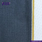 Close-up of SPACE GREY DENIM fabric with a striped pattern featuring blue, yellow, and white sections, branded 'Indigo Tailor'.