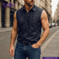 Man wearing a sleeveless STRETCHY SELVEDGE DEEP INDIGO PINK ID shirt and jeans on a city street, with 'Indigotailor' branding.