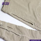 Close-up of SUEDE JACKET with a visible brand logo on a white background