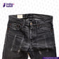 SUPER BLACK DENIM jeans with visible wear on a white background, featuring the Indigotailor logo.