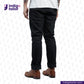 Person wearing SUPER BLACK DENIM pants and brown boots with 'Indigo Tailor' logo.