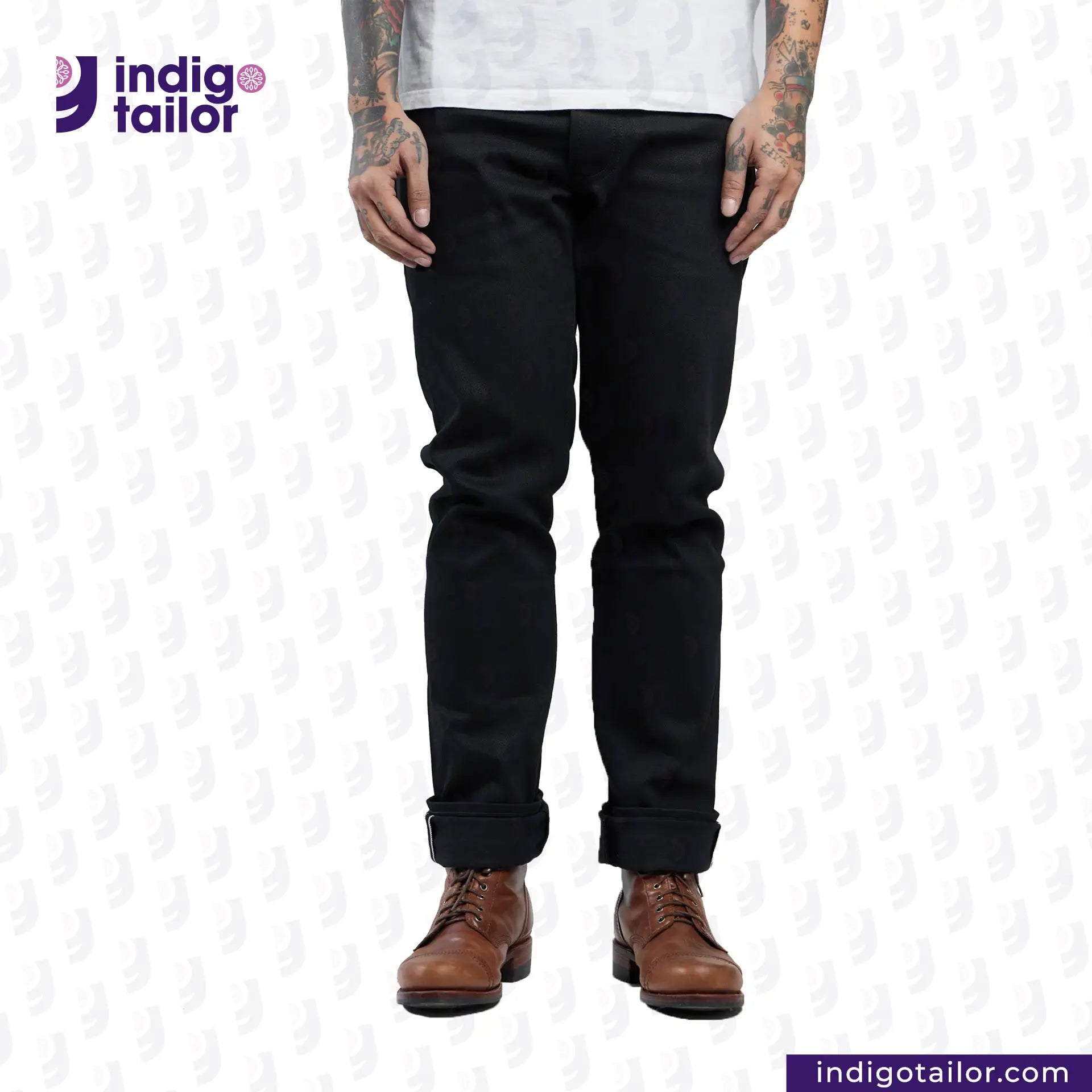 Person wearing SUPER BLACK DENIM jeans with 'Indigotailor' logo and website on a white background