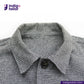 Close-up of a TWEED HOUNDSTOOTH COVERALL JACKET checkered collar with 'Indigotailor' logo.