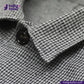 Close-up of a TWEED HOUNDSTOOTH COVERALL JACKET color with a button, featuring the 'indigotailor' brand.