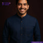 Man wearing a VINTAGE BLUE SELVEDGE DENIM shirt with Indigotailor logo and website on a dark background