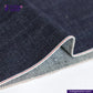 Close-up of VINTAGE SLUB DENIM fabric with a visible brand logo and website.