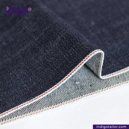 Close-up of VINTAGE SLUB DENIM fabric with a visible brand logo and website.